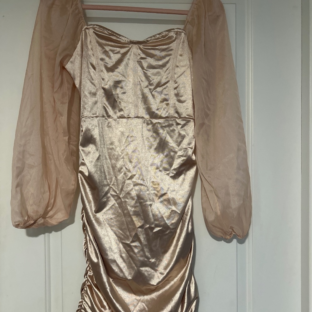 Tight fitted rose gold/champagne dress